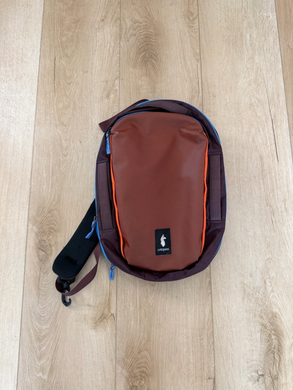 Cotopaxi Sling Bag.